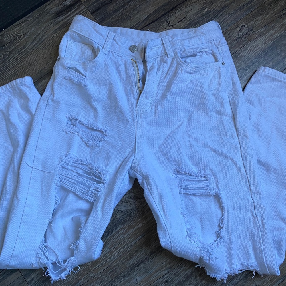 White ripped baggy jeans